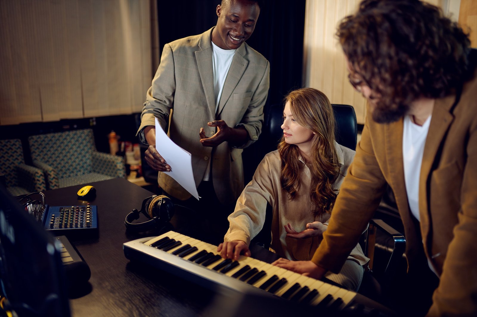 male-and-female-performers-recording-studio.jpg